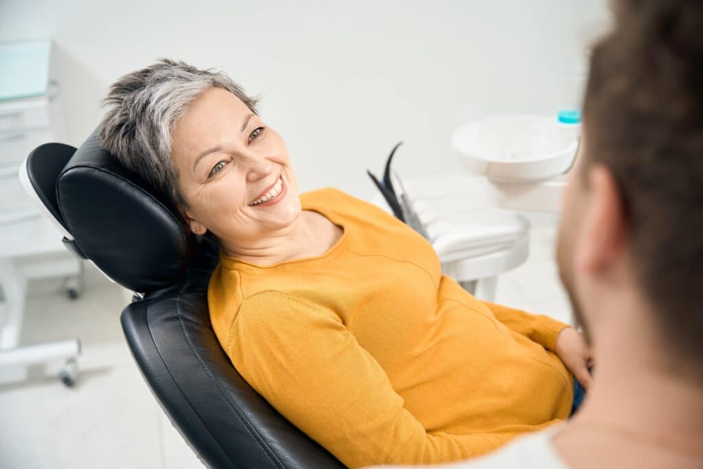 Patient receiving dental implants at a clinic in Sherman Oaks.